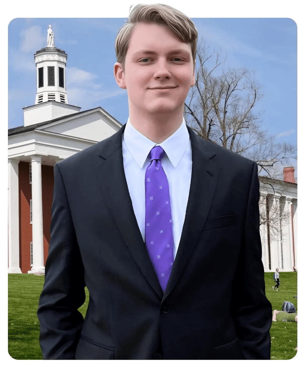 Collegewise student Tom M. wearing a suit and purple tie on a college campus. Collegewise student Tom M. wearing a suit and purple tie on a college campus.