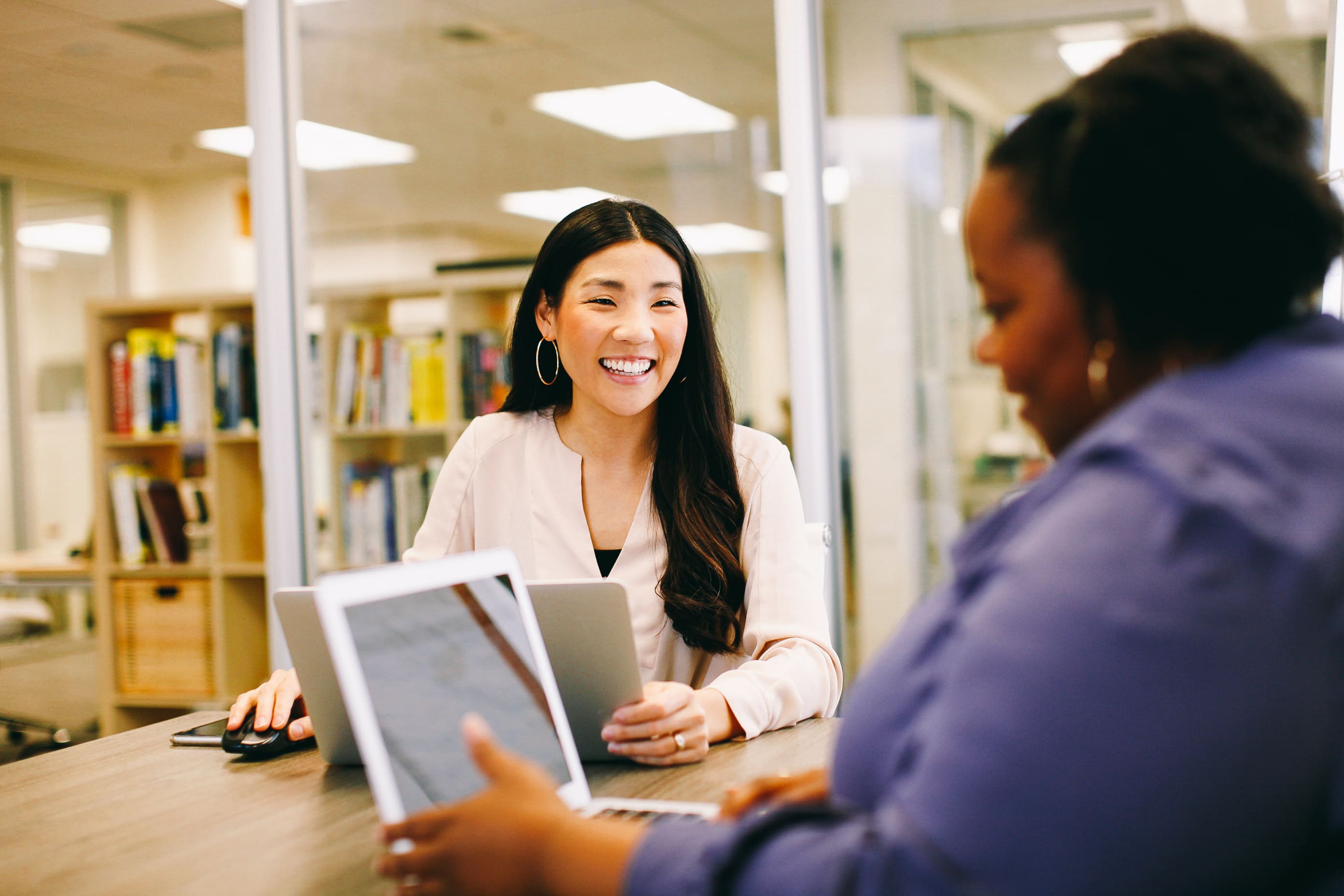 Two women having an in person meeting